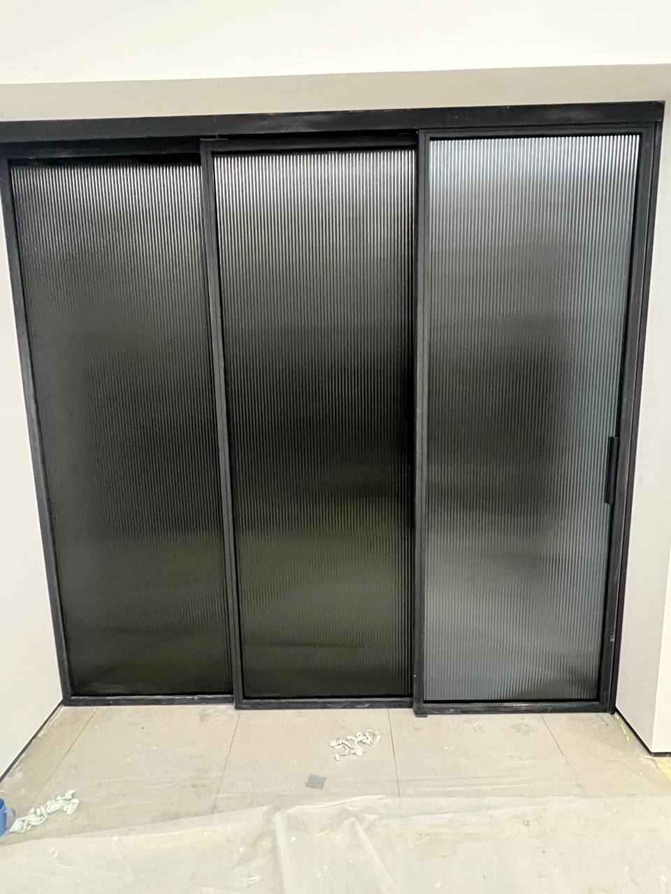 Triple panel door